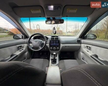 Чорний Кіа Черато, об'ємом двигуна 1.6 л та пробігом 224 тис. км за 4900 $, фото 38 на Automoto.ua