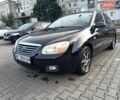 Черный Киа Черато, объемом двигателя 1.59 л и пробегом 208 тыс. км за 3800 $, фото 1 на Automoto.ua