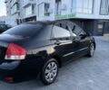 Черный Киа Черато, объемом двигателя 1.6 л и пробегом 225 тыс. км за 4400 $, фото 12 на Automoto.ua
