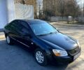 Чорний Кіа Черато, об'ємом двигуна 1.6 л та пробігом 260 тис. км за 4000 $, фото 1 на Automoto.ua