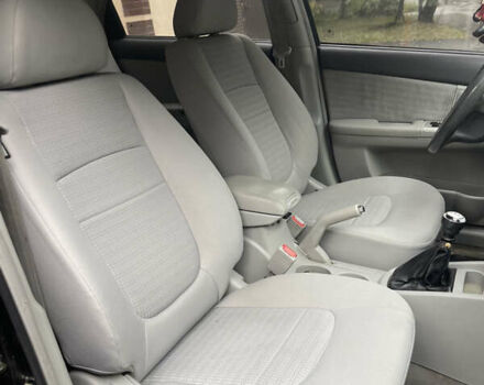 Черный Киа Черато, объемом двигателя 1.6 л и пробегом 211 тыс. км за 3200 $, фото 6 на Automoto.ua