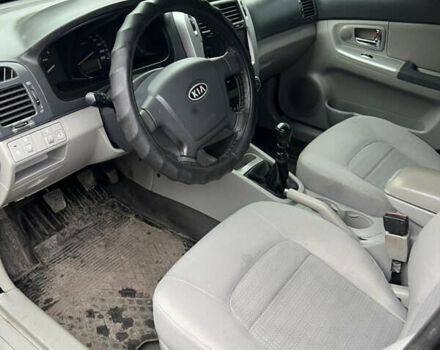 Черный Киа Черато, объемом двигателя 1.58 л и пробегом 355 тыс. км за 3500 $, фото 11 на Automoto.ua