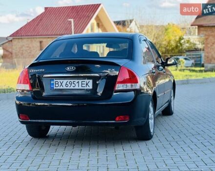 Черный Киа Черато, объемом двигателя 1.6 л и пробегом 210 тыс. км за 3750 $, фото 6 на Automoto.ua