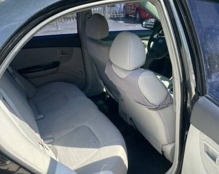 Черный Киа Черато, объемом двигателя 1.59 л и пробегом 210 тыс. км за 4100 $, фото 13 на Automoto.ua