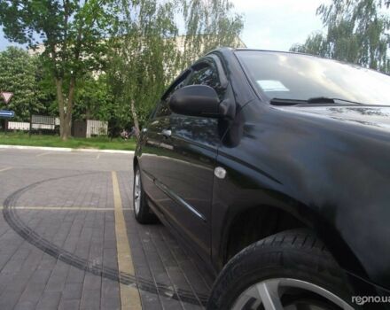 Черный Киа Черато, объемом двигателя 1.6 л и пробегом 260 тыс. км за 5600 $, фото 7 на Automoto.ua