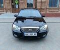 Чорний Кіа Черато, об'ємом двигуна 1.6 л та пробігом 240 тис. км за 4500 $, фото 1 на Automoto.ua