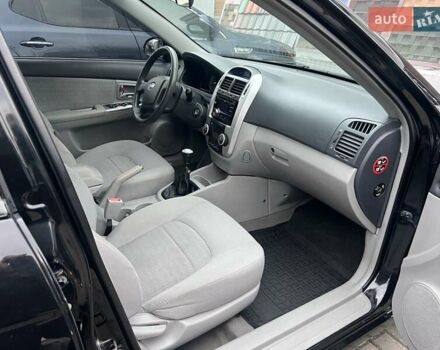 Черный Киа Черато, объемом двигателя 1.6 л и пробегом 180 тыс. км за 4900 $, фото 6 на Automoto.ua