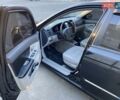Черный Киа Черато, объемом двигателя 1.98 л и пробегом 335 тыс. км за 4100 $, фото 10 на Automoto.ua