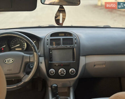 Черный Киа Черато, объемом двигателя 1.6 л и пробегом 235 тыс. км за 4900 $, фото 10 на Automoto.ua