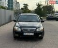 Черный Киа Черато, объемом двигателя 1.59 л и пробегом 242 тыс. км за 2750 $, фото 1 на Automoto.ua