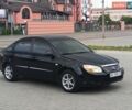 Черный Киа Черато, объемом двигателя 1.6 л и пробегом 176 тыс. км за 3870 $, фото 1 на Automoto.ua