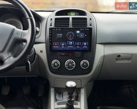 Чорний Кіа Черато, об'ємом двигуна 1.6 л та пробігом 224 тис. км за 4900 $, фото 41 на Automoto.ua