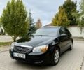 Чорний Кіа Черато, об'ємом двигуна 1.6 л та пробігом 320 тис. км за 3500 $, фото 1 на Automoto.ua