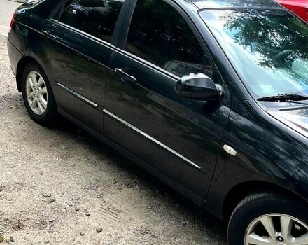 Черный Киа Черато, объемом двигателя 2 л и пробегом 163 тыс. км за 3000 $, фото 1 на Automoto.ua