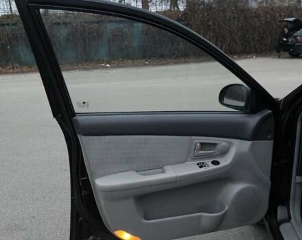 Чорний Кіа Черато, об'ємом двигуна 1.59 л та пробігом 300 тис. км за 4550 $, фото 28 на Automoto.ua