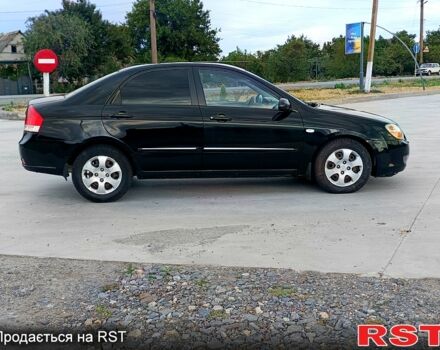 Черный Киа Черато, объемом двигателя 1.6 л и пробегом 210 тыс. км за 4000 $, фото 2 на Automoto.ua