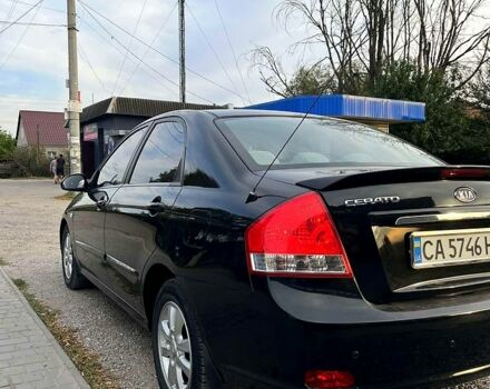 Черный Киа Черато, объемом двигателя 2 л и пробегом 186 тыс. км за 5300 $, фото 1 на Automoto.ua