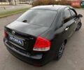 Чорний Кіа Черато, об'ємом двигуна 1.6 л та пробігом 224 тис. км за 4900 $, фото 24 на Automoto.ua