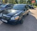Чорний Кіа Черато, об'ємом двигуна 1.6 л та пробігом 106 тис. км за 5300 $, фото 22 на Automoto.ua