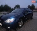 Черный Киа Черато, объемом двигателя 2 л и пробегом 340 тыс. км за 5500 $, фото 1 на Automoto.ua