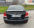 Черный Киа Черато, объемом двигателя 1.6 л и пробегом 232 тыс. км за 3850 $, фото 2 на Automoto.ua