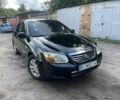Черный Киа Черато, объемом двигателя 1.6 л и пробегом 200 тыс. км за 3950 $, фото 1 на Automoto.ua