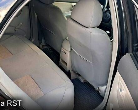 Черный Киа Черато, объемом двигателя 1.6 л и пробегом 260 тыс. км за 5300 $, фото 6 на Automoto.ua