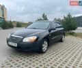Чорний Кіа Черато, об'ємом двигуна 1.6 л та пробігом 197 тис. км за 3200 $, фото 1 на Automoto.ua
