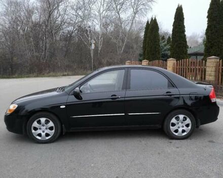 Чорний Кіа Черато, об'ємом двигуна 1.59 л та пробігом 300 тис. км за 4550 $, фото 7 на Automoto.ua