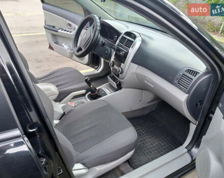 Черный Киа Черато, объемом двигателя 1.59 л и пробегом 223 тыс. км за 4400 $, фото 3 на Automoto.ua