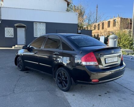 Чорний Кіа Черато, об'ємом двигуна 2 л та пробігом 362 тис. км за 3900 $, фото 2 на Automoto.ua