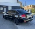 Чорний Кіа Черато, об'ємом двигуна 2 л та пробігом 362 тис. км за 3900 $, фото 2 на Automoto.ua
