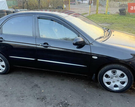 Чорний Кіа Черато, об'ємом двигуна 1.59 л та пробігом 250 тис. км за 4300 $, фото 13 на Automoto.ua