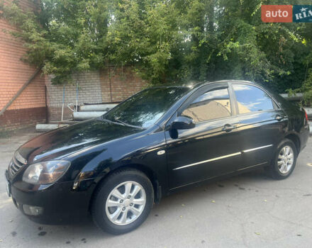 Чорний Кіа Черато, об'ємом двигуна 1.6 л та пробігом 290 тис. км за 5300 $, фото 3 на Automoto.ua