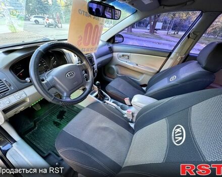 Черный Киа Черато, объемом двигателя 1.6 л и пробегом 174 тыс. км за 4550 $, фото 4 на Automoto.ua