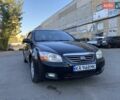 Черный Киа Черато, объемом двигателя 1.98 л и пробегом 335 тыс. км за 4100 $, фото 1 на Automoto.ua