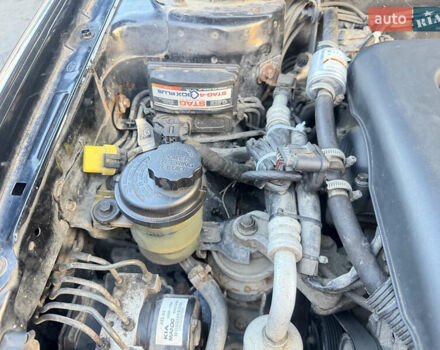 Чорний Кіа Черато, об'ємом двигуна 1.59 л та пробігом 250 тис. км за 4300 $, фото 14 на Automoto.ua