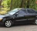 Черный Киа Черато, объемом двигателя 1.59 л и пробегом 78 тыс. км за 5499 $, фото 2 на Automoto.ua