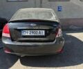 Чорний Кіа Черато, об'ємом двигуна 1.6 л та пробігом 229 тис. км за 1300 $, фото 1 на Automoto.ua