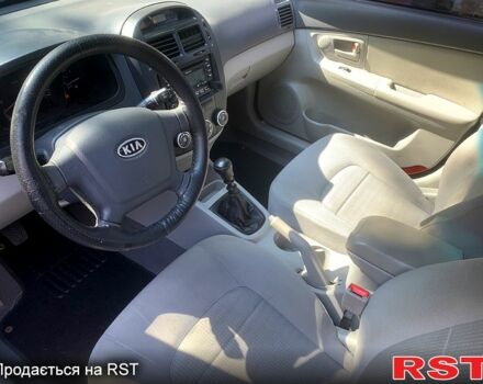 Черный Киа Черато, объемом двигателя 1.6 л и пробегом 220 тыс. км за 3800 $, фото 10 на Automoto.ua