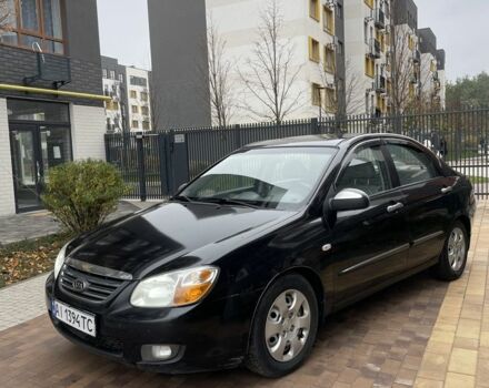 Черный Киа Черато, объемом двигателя 1.6 л и пробегом 256 тыс. км за 4200 $, фото 1 на Automoto.ua