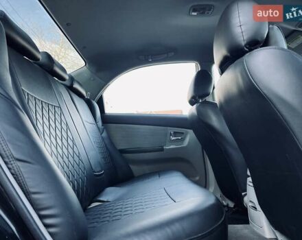 Киа Черато 2007 в Черновцах на Automoto.ua Черный Киа Черато, объемом двигателя 1.6 л и пробегом 210 тыс. км за 3950 $, фото 34 на Automoto.ua