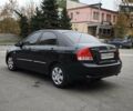 Чорний Кіа Черато, об'ємом двигуна 1.6 л та пробігом 204 тис. км за 3700 $, фото 4 на Automoto.ua