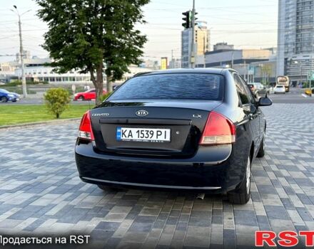 Черный Киа Черато, объемом двигателя 1.6 л и пробегом 220 тыс. км за 3800 $, фото 3 на Automoto.ua