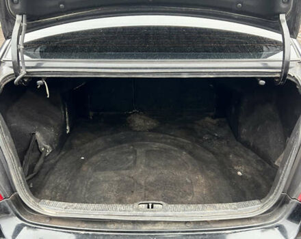 Черный Киа Черато, объемом двигателя 1.58 л и пробегом 355 тыс. км за 3500 $, фото 10 на Automoto.ua