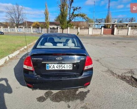 Черный Киа Черато, объемом двигателя 1.59 л и пробегом 349 тыс. км за 4000 $, фото 2 на Automoto.ua