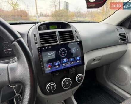 Чорний Кіа Черато, об'ємом двигуна 1.6 л та пробігом 224 тис. км за 4900 $, фото 44 на Automoto.ua