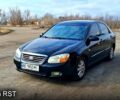 Черный Киа Черато, объемом двигателя 2 л и пробегом 190 тыс. км за 4200 $, фото 1 на Automoto.ua