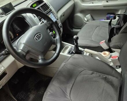 Черный Киа Черато, объемом двигателя 1.98 л и пробегом 180 тыс. км за 4500 $, фото 12 на Automoto.ua