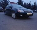 Черный Киа Черато, объемом двигателя 1.6 л и пробегом 233 тыс. км за 3599 $, фото 1 на Automoto.ua